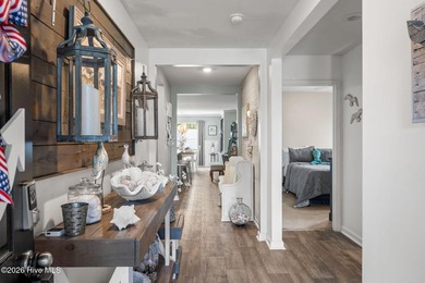 This immaculate, one-level coastal home sits on an oversized lot - photo 4
