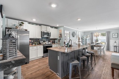 This immaculate, one-level coastal home sits on an oversized lot - photo 7