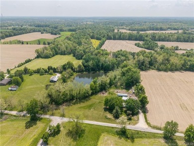 5.03 scenic acres with a pond in a tranquil setting near Madison - photo 14