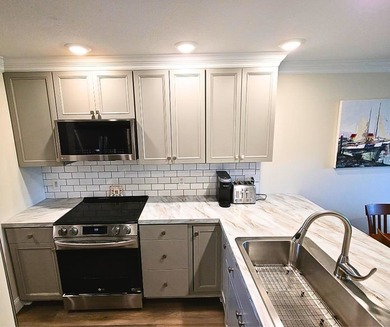 Enjoy convenient one-floor living in this recently renovated - photo 4