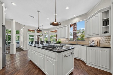 Perched along the scenic greens of Bridlewood, this spectacular - photo 11