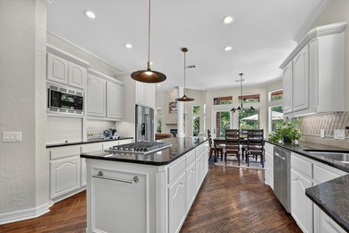 Perched along the scenic greens of Bridlewood, this spectacular - photo 12
