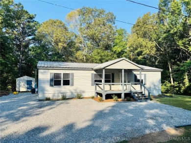 Lake Home For Sale in Titus, Alabama