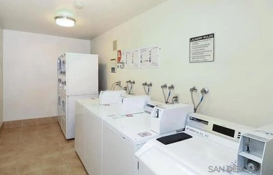 Tucked away in a peaceful setting within the desirable Allied - photo 23
