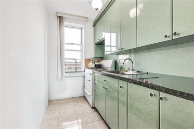 Bright and well-situated one-bedroom co-op on a top floor in a