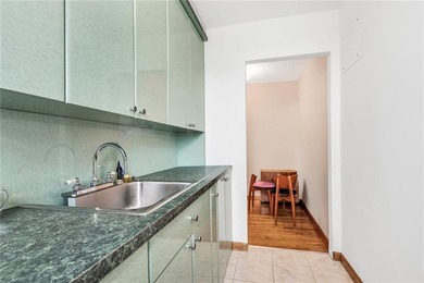 Bright and well-situated one-bedroom co-op on a top floor in a