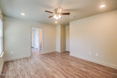 Welcome to this well-maintained four-bedroom home, centrally - photo 16