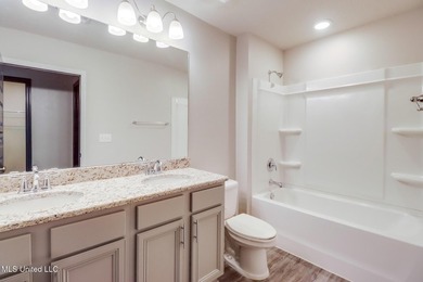 Welcome to this well-maintained four-bedroom home, centrally - photo 19