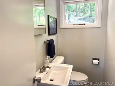 Sitting on a gentle lot in a beautiful cove location, this gem - photo 21