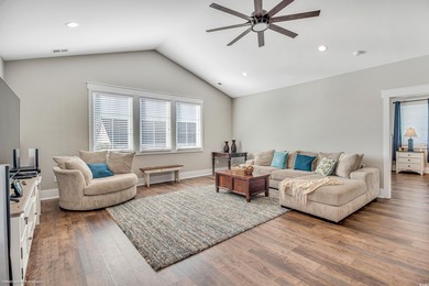 Experience luxury coastal living in this custom-designed 5