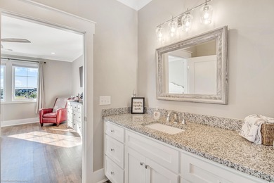 Experience luxury coastal living in this custom-designed 5