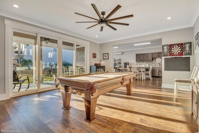 Experience luxury coastal living in this custom-designed 5