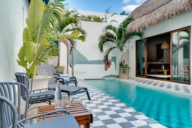 Tucked away in the lush greenery of Tulum's desirable Region 15 - photo 2
