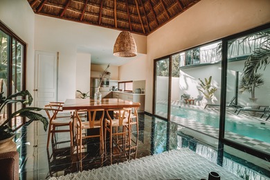 Tucked away in the lush greenery of Tulum's desirable Region 15 - photo 4