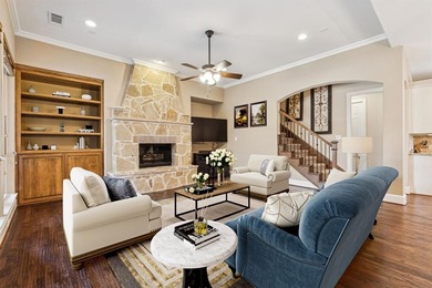 Step into luxury with this pristine custom Highland home