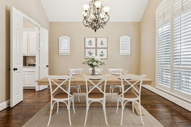 Step into luxury with this pristine custom Highland home