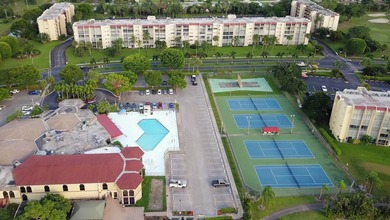 WELCOME TO YOUR SPACIOUS,SPARKLING UPDATED CONDO OVERLOOKING THE - photo 24