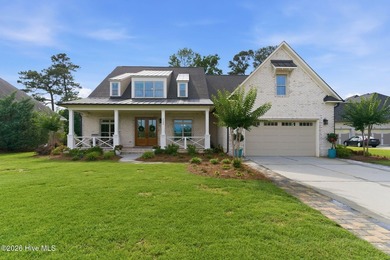 Welcome to this exceptional 4 bedroom, 4 bath custom home in the - photo 1