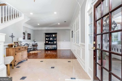 Custom-built home. Winding staircase & grand foyer. Huge master - photo 29