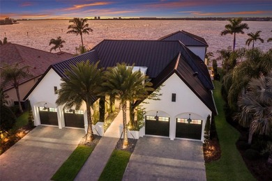 WELCOME to a breathtaking WATERFRONT masterpiece in the - photo 2