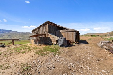 This impressive 320-acre ranch property offers seven scenic - photo 9