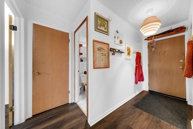 Welcome to this sun-drenched 1-bedroom, 1-bath residence in
