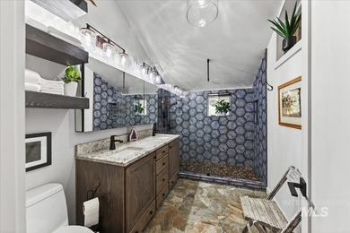 Set against the breathtaking Boise Mountains, this private view - photo 9