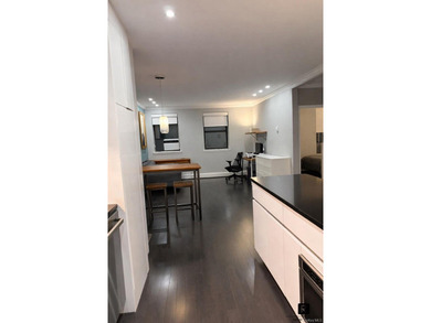 Turnkey and meticulously upgraded, Residence 4C is a - photo 2