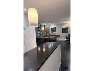 Turnkey and meticulously upgraded, Residence 4C is a - photo 3