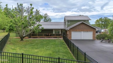 Lake Home For Sale in Piney Flats, Tennessee