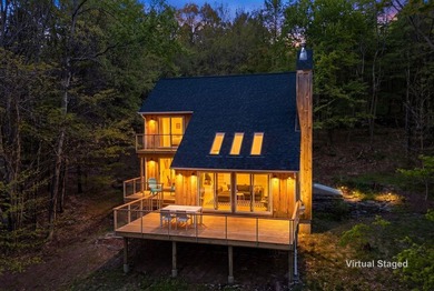 Bovina forest haven. Although this modern Danish-style house was - photo 2