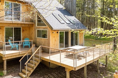 Bovina forest haven. Although this modern Danish-style house was - photo 6