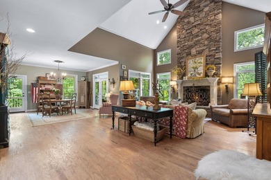 Hidden among the privacy of lush hardwoods in coveted Lake Adger - photo 12
