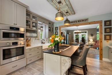 Hidden among the privacy of lush hardwoods in coveted Lake Adger - photo 14