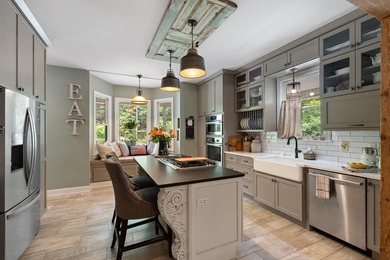 Hidden among the privacy of lush hardwoods in coveted Lake Adger - photo 15