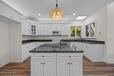 LUXURY LIVING ON THE OAK ISLAND GOLF COURSE. Gorgeous custom