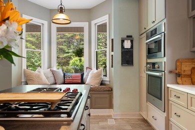 Hidden among the privacy of lush hardwoods in coveted Lake Adger - photo 16