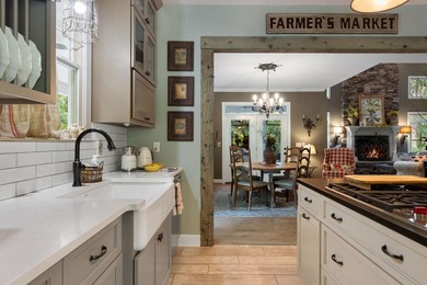 Hidden among the privacy of lush hardwoods in coveted Lake Adger - photo 17