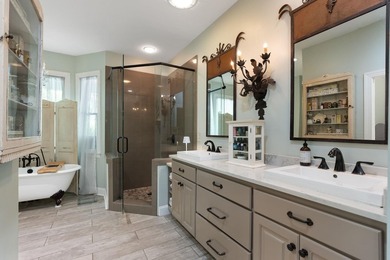 Hidden among the privacy of lush hardwoods in coveted Lake Adger - photo 24