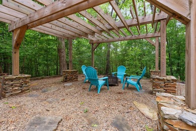 Hidden among the privacy of lush hardwoods in coveted Lake Adger - photo 35