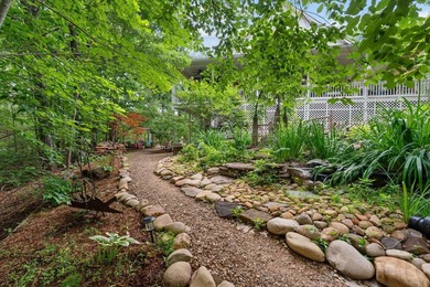 Hidden among the privacy of lush hardwoods in coveted Lake Adger - photo 42