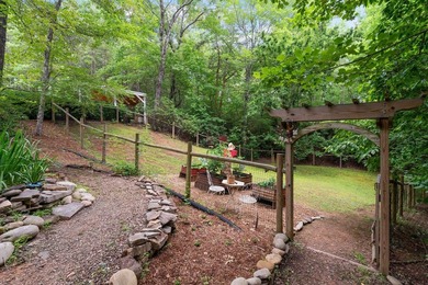Hidden among the privacy of lush hardwoods in coveted Lake Adger - photo 47