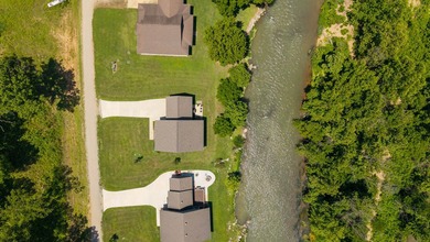 Spring River Front Retreat | Gated Community | 1.13 Acres | - photo 49