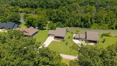 Spring River Front Retreat | Gated Community | 1.13 Acres | - photo 50