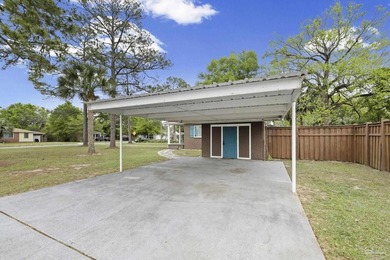 Welcome to this well-maintained brick home in Pensacola - photo 6