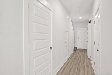 This newer 3 bedroom, 2 1/2 bath townhome is located in a gated - photo 4