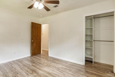 Step into the delightful 3-bedroom, 2-bath haven nestled in the - photo 11