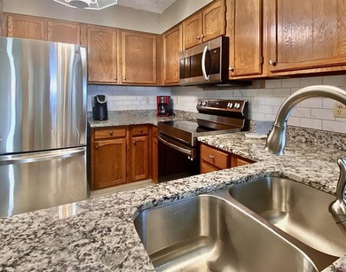 Fabulous view from this 3rd floor corner unit, elevator takes - photo 12