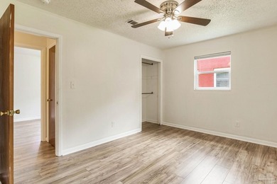 Step into the delightful 3-bedroom, 2-bath haven nestled in the - photo 12