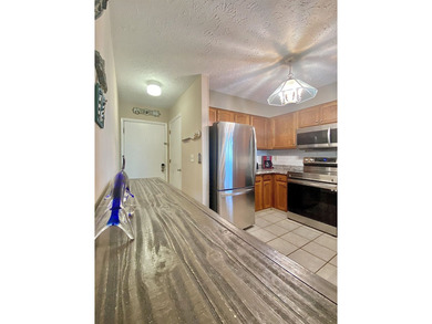 Fabulous view from this 3rd floor corner unit, elevator takes - photo 13